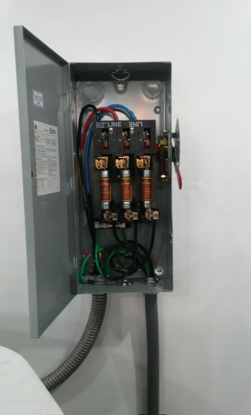 Three-phase disconnect switch installed for Smoke Detector Installation in Farmington